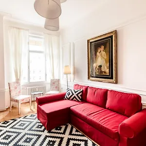 Appartamento Golden Esthetic With Red Sofa